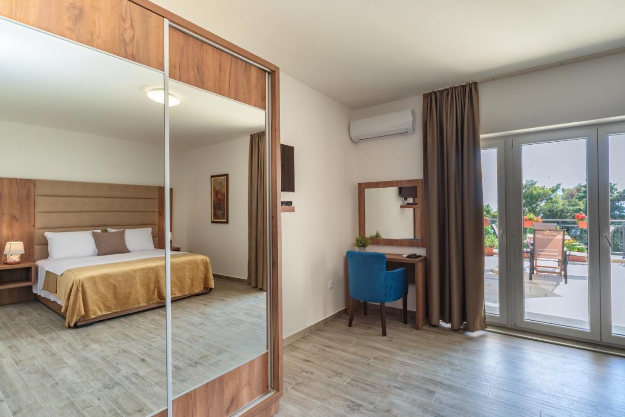 Mika'S Seaview Apartments Bar Chambre photo