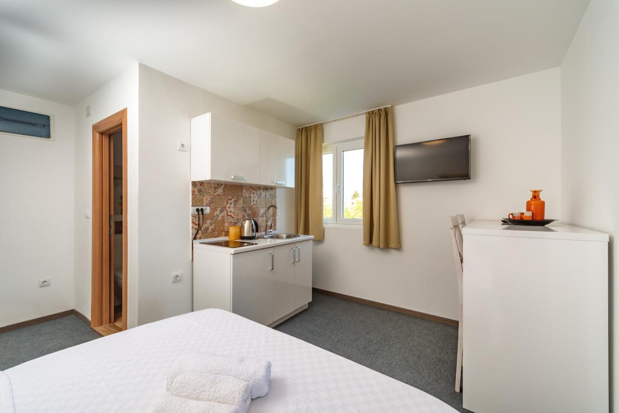 Mika'S Seaview Apartments Bar Chambre photo